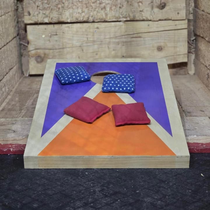 ¡Reto de Cornhole + bebida + palomitas por solo 9 €!